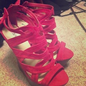 Wedges. Never worn. Heels are 6 inches tall.